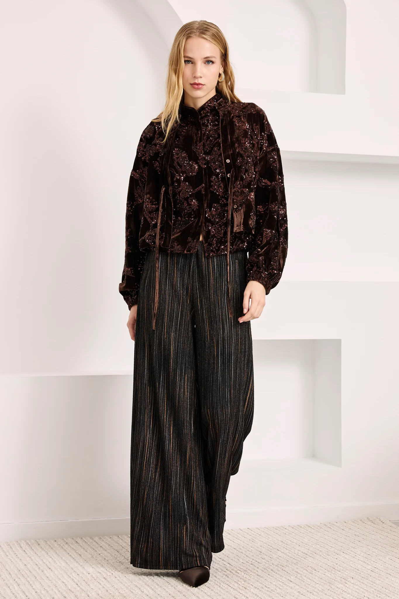 Pantaloni in lurex a righe