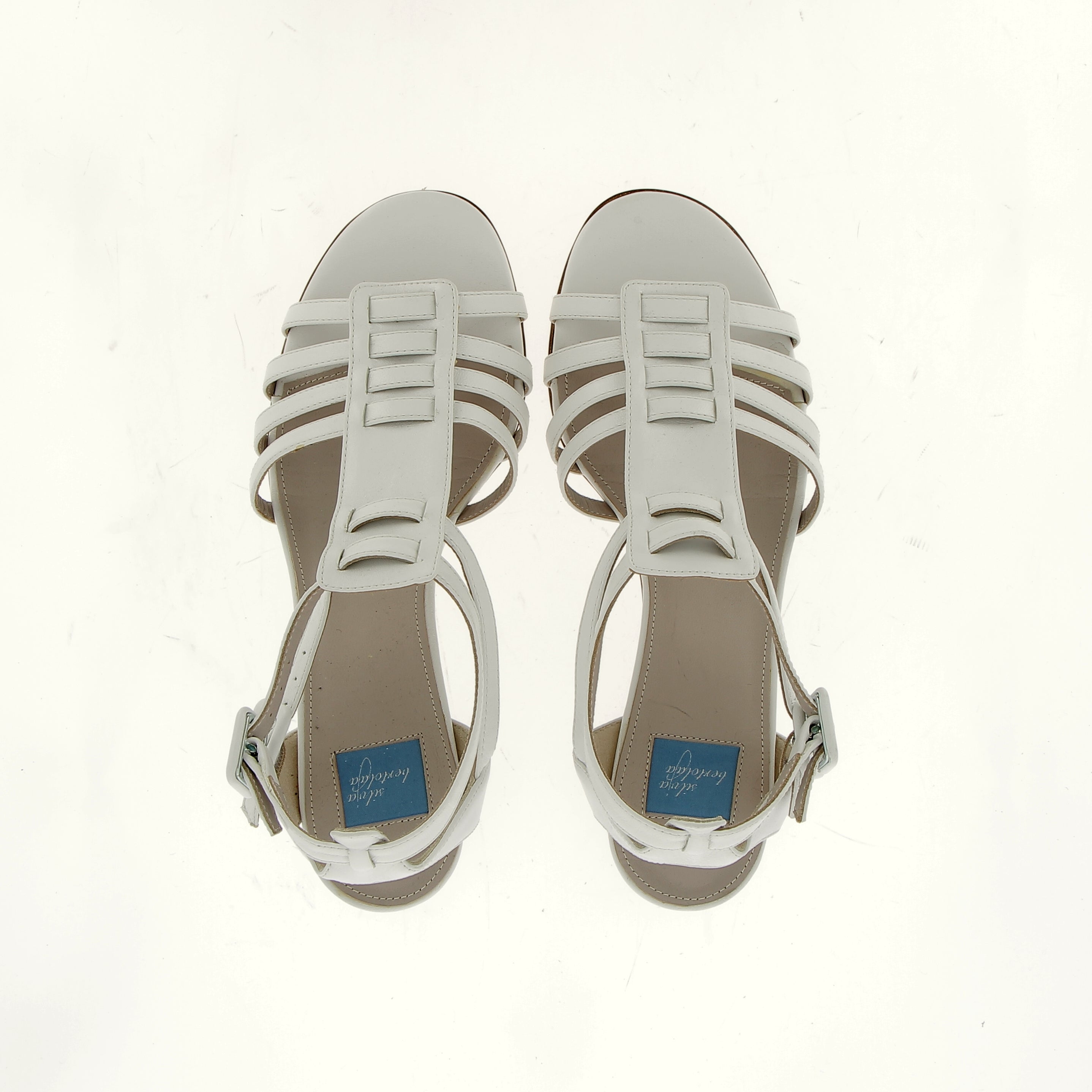 Gladiator sandal on White nappa leather heel