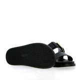 Sandalo in pelle nera con sottopiede imbottito e fibbia