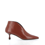 Ankle-length in brick-colored Verlux fabric.