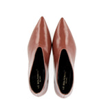 Ankle-length in brick-colored Verlux fabric.