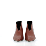 Ankle-length in brick-colored Verlux fabric.