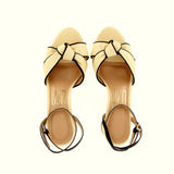 Cream and black straw knot sandal with medium heel