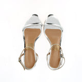 Silver sandal with ankle strap and heel