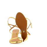 Gold sandal with ankle strap and heel