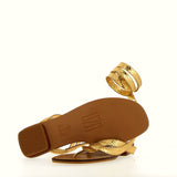 Flat gold snake sandal with snake motif