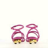 Sandal in soft fuchsia leather with gold heel