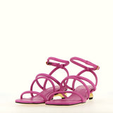 Sandal in soft fuchsia leather with gold heel