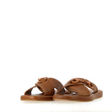 Leather sandal with buckle accessory