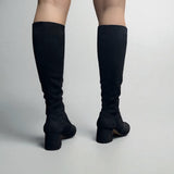 Black, form-fitting boot