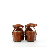 Platform sandal in tan woven leather with straps