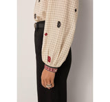 Colette Ivory checks