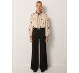 Colette Ivory checks