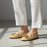 Mocassino squadrato con nappine supersoft in nappa da guanto