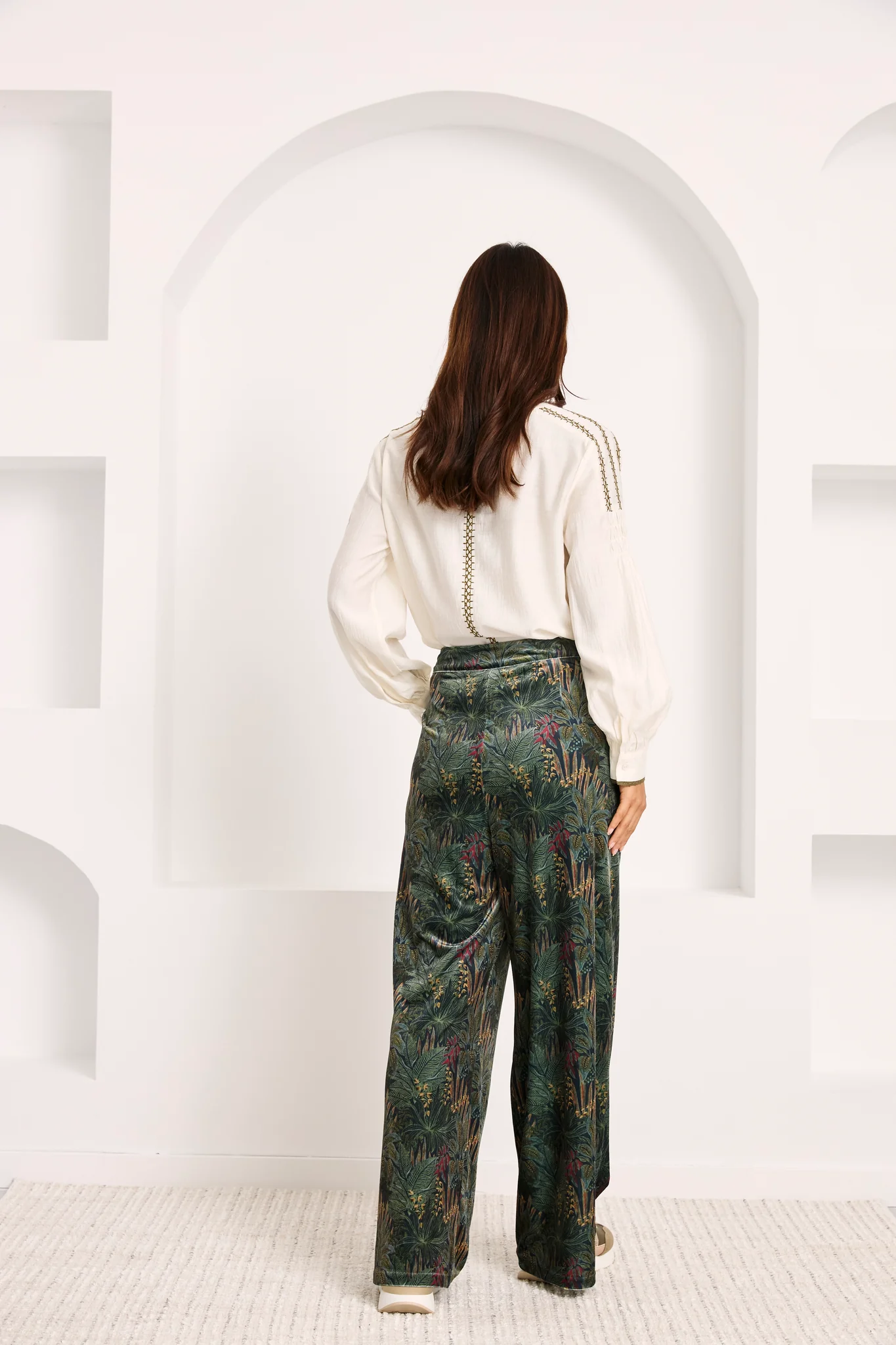 Pantaloni in velluto con stampa botanica