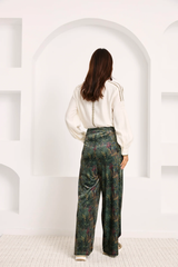 Pantaloni in velluto con stampa botanica