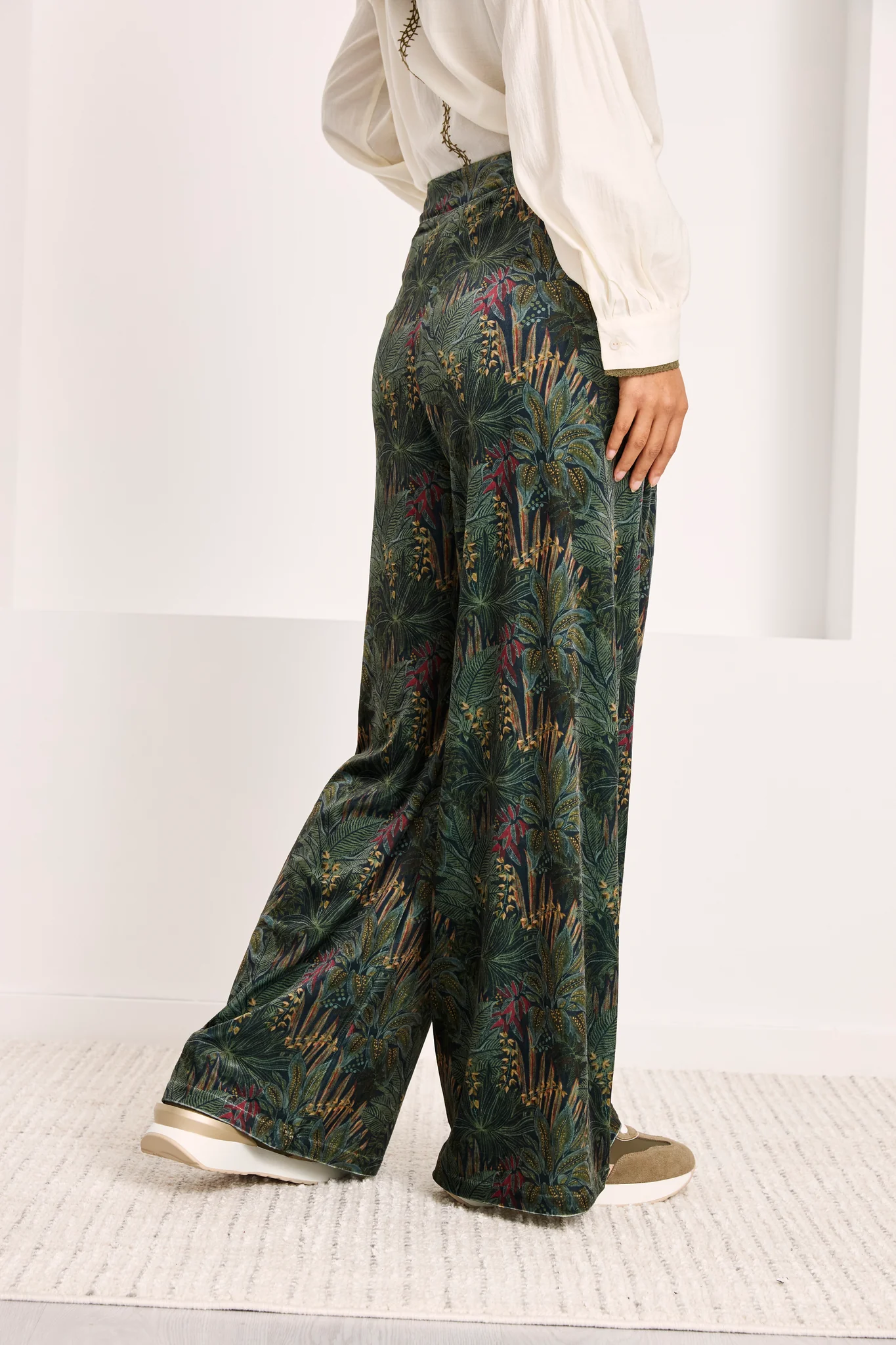 Pantaloni in velluto con stampa botanica