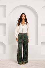 Pantaloni in velluto con stampa botanica