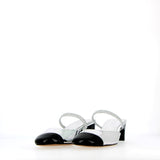 Silver sling back with black toe on low heel