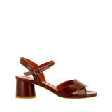 Brown leather medium heel sandal with raw cut