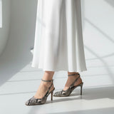 Slingback snake print con cinturino alla caviglia