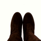 Chocolate suede tube boot with invisible inner wedge.