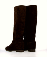Chocolate suede tube boot with invisible inner wedge.