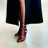 Half-closed lace-up sandal in burgundy nappa leather.