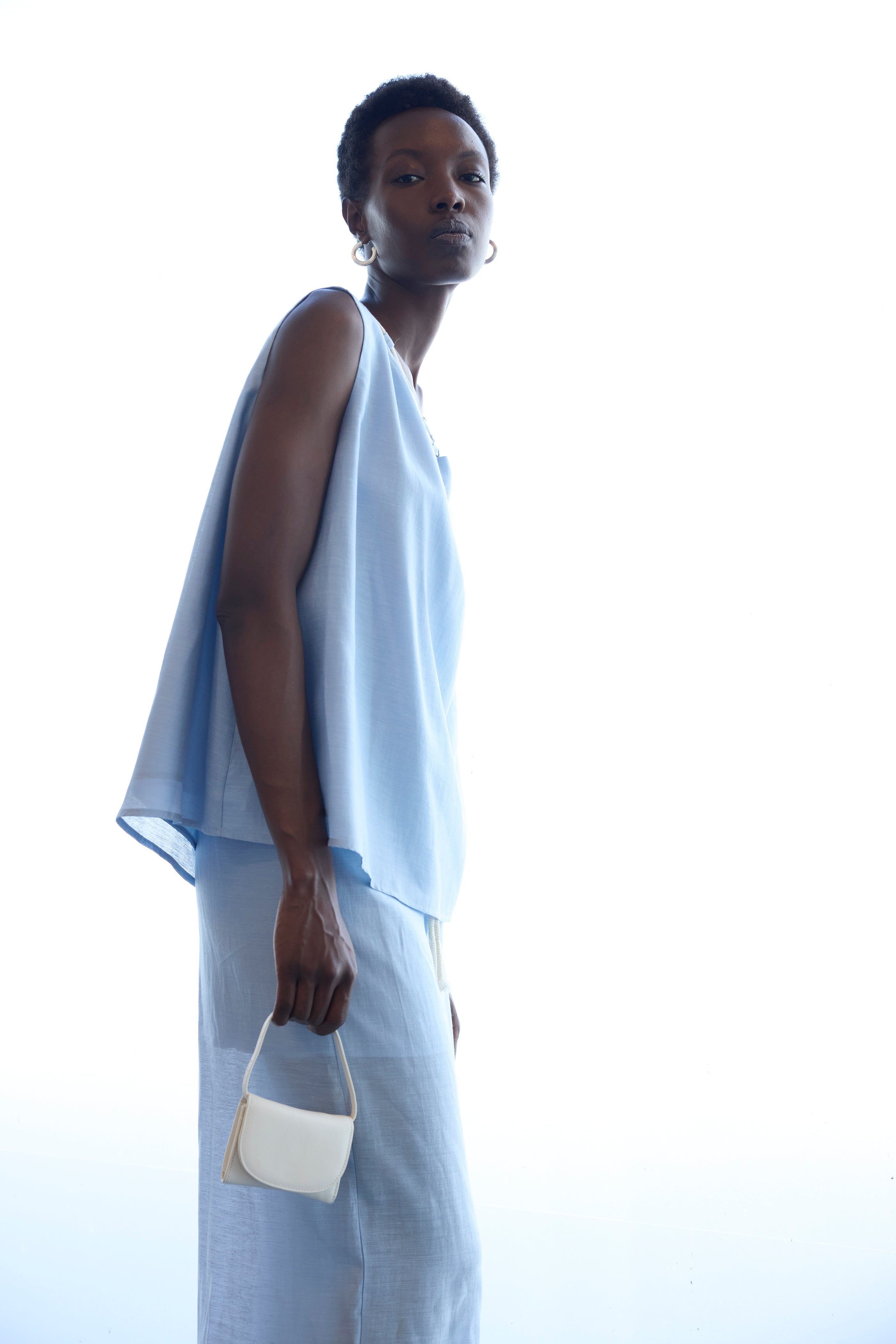 Top celeste con corda