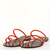 Flat sandal in orange rhinestones