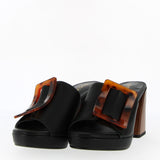 Black sandal on high heel