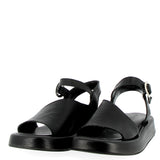 Flat sandal with cirìturino in black leather