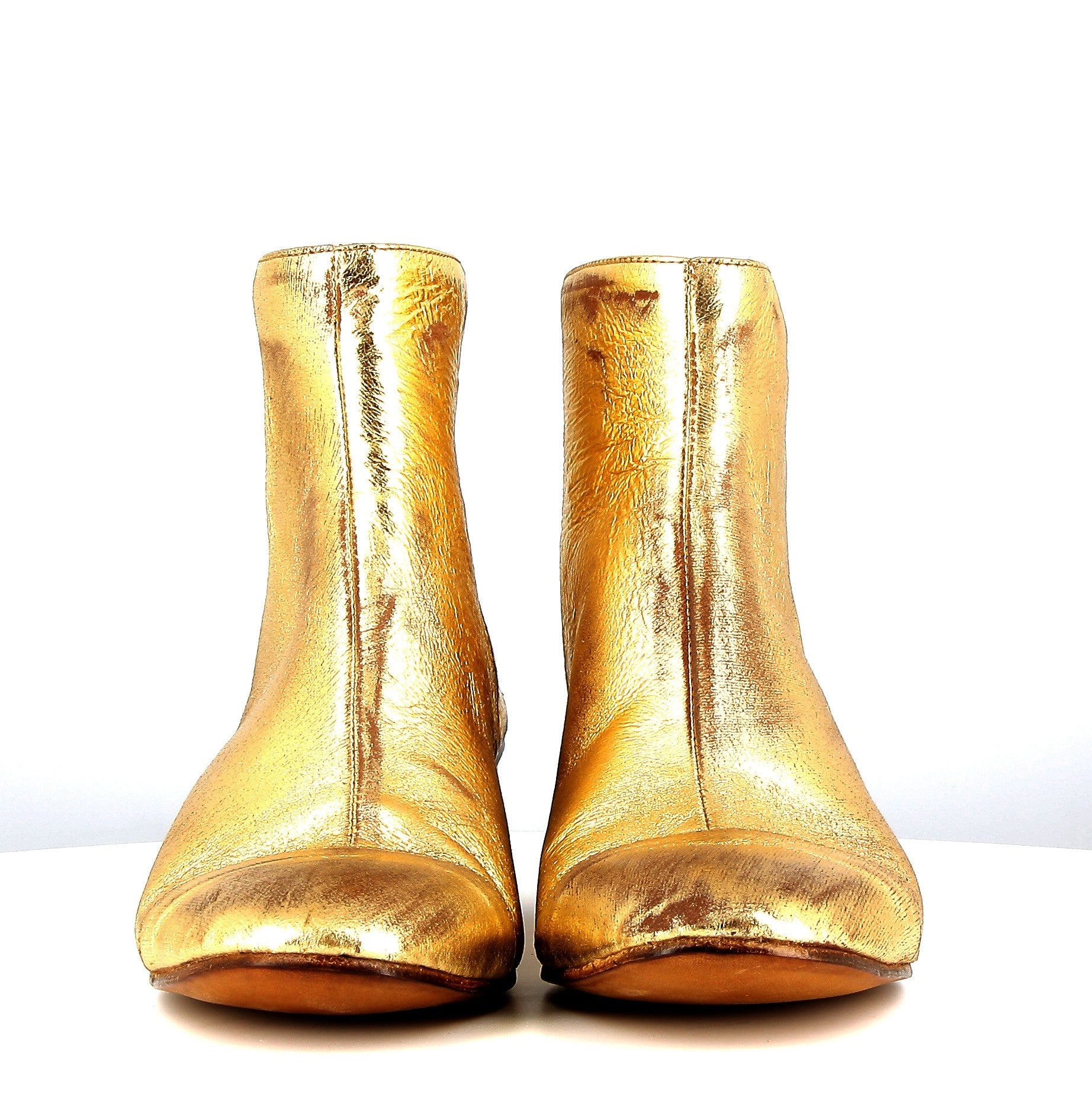 Vintage effect gold ankle boot with rounded heel